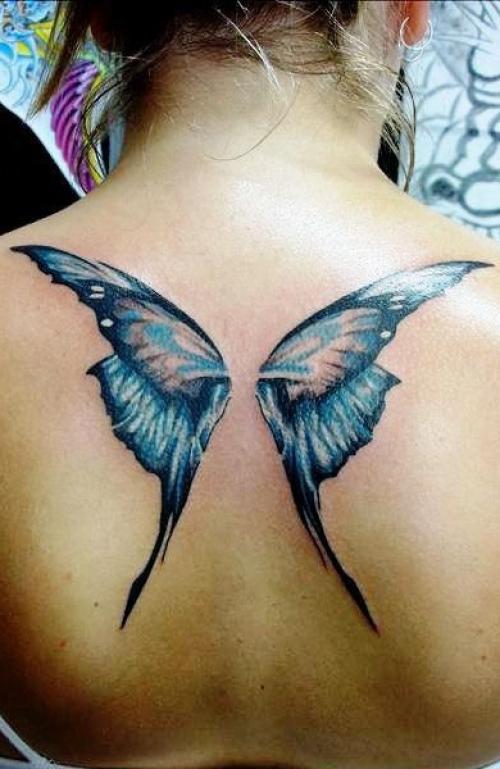 Тату на пояснице крылья. Татуировка крылья