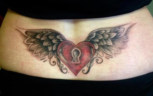 Тату на пояснице надпись. Тату на пояснице: значение