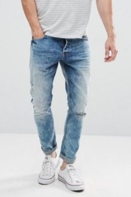 Мужские джинсы с резинкой внизу. Иногда используют трикотажные ленты, которые почти не тянутся.