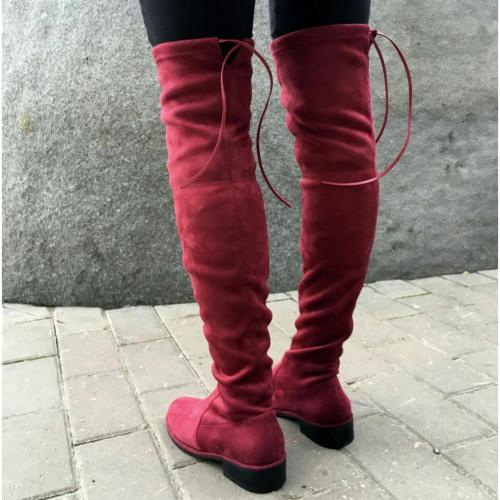 Что носить с ботфортами без каблука. Особенности и преимущества